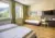 Ihr seht ein Family und Friends 3 Plus Zimmer im JUFA Hotel Schladming***.