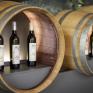 Sie sehen ein Regal aus einem Weinfass gemacht mit drei Weinflaschen in der hauseigenen Vinothek im JUFA Hotel Schilcherland*** in der Steiermark